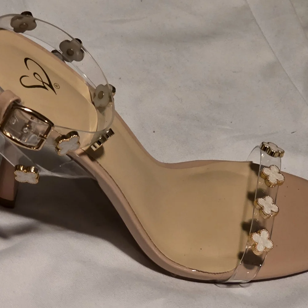 Clear Strap Heels with Beige Footbed and White Floral Accents - Picture 2 of 4